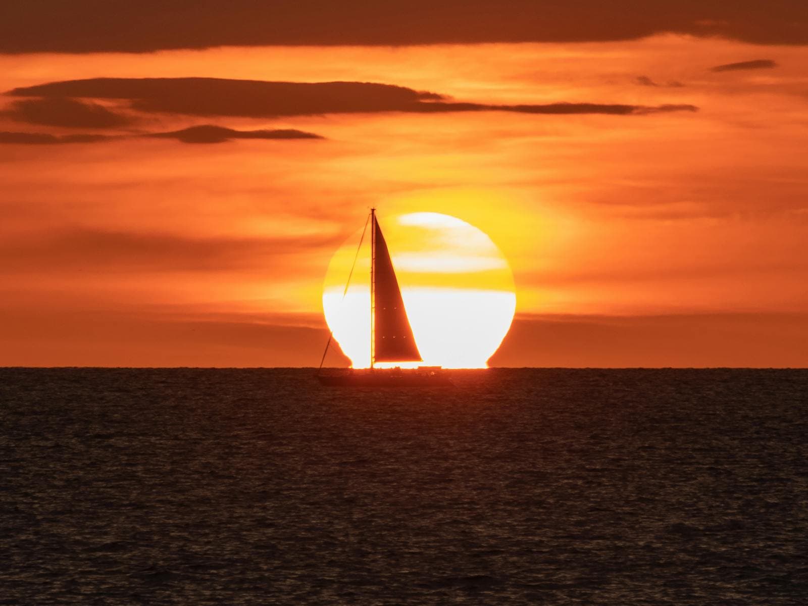 Golden Pacific sunset representing Playa Langosta coastal living near Tamarindo Costa Rica